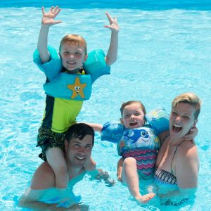Family Of Kids And Adults Swimming In Pool At Fern Resort
